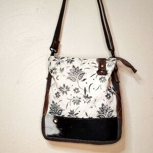 MYRA Elegant White and Black Crossbody Bag with Floral Design